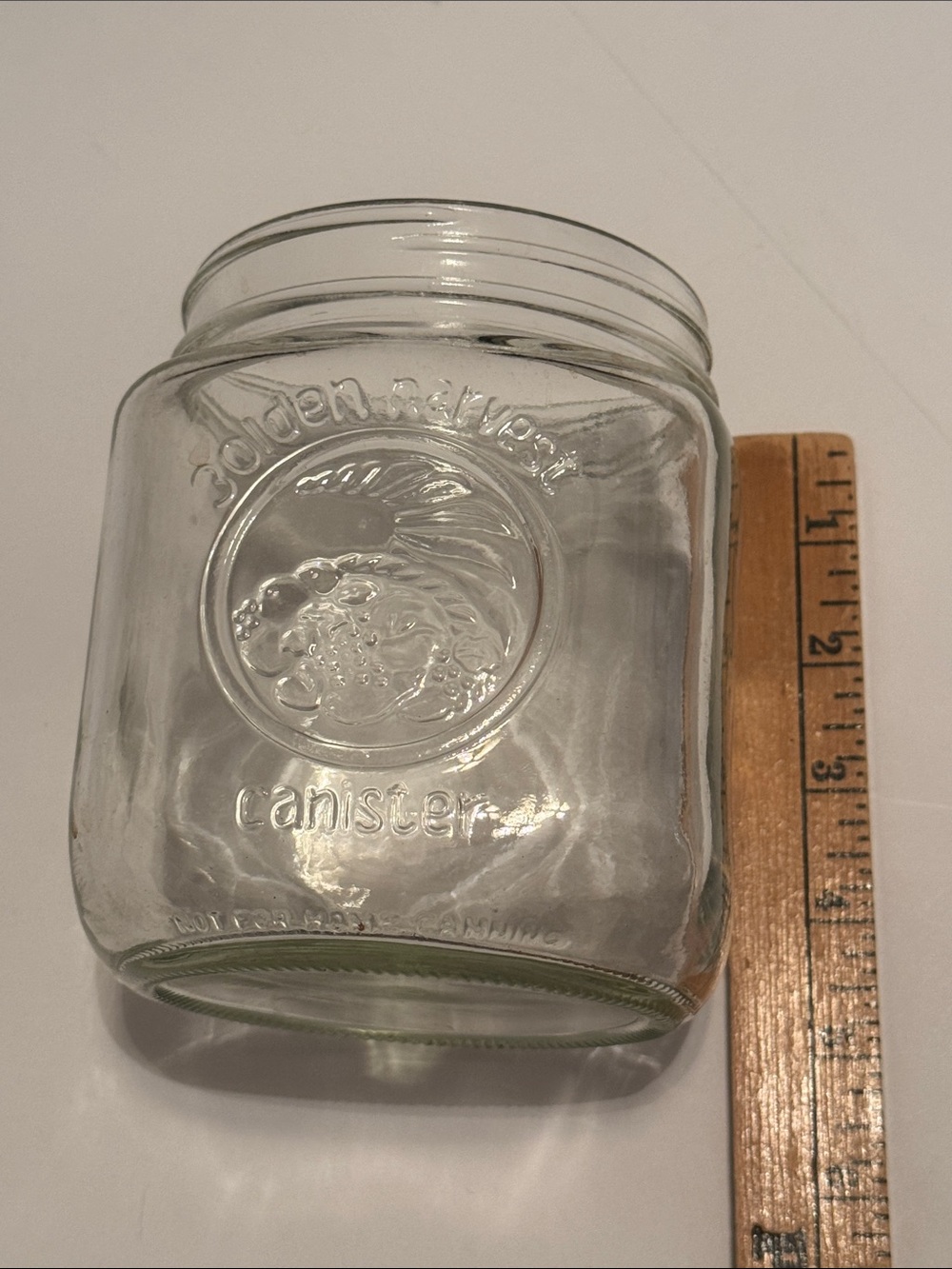 Vintage Golden Harvest Glass Canister Jar with Embossed Design - Clear
